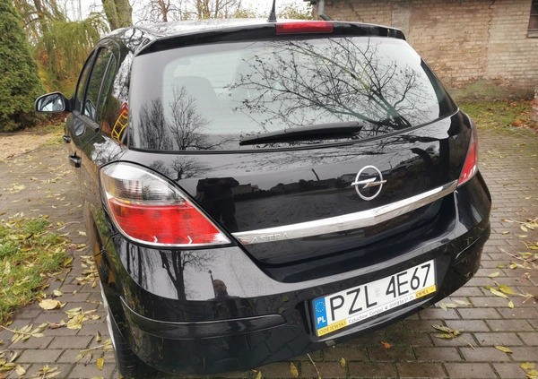 Opel Astra cena 17500 przebieg: 243080, rok produkcji 2011 z Ostróda małe 704